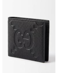 Gucci - Logo Embossed Bi-Fold Wallet - Lyst