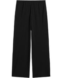 TOTEME - Totême Elasticated Waistband Wide Leg Pants - Lyst