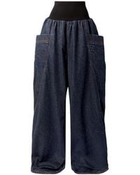 Alaïa - Alaïa Track Denim Pants - Lyst