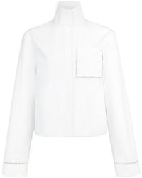 Alaïa - Alaïa High Neck Pocket Detail Top - Lyst