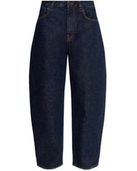 Alaïa - Alaa Low Round Denim Pants - Lyst
