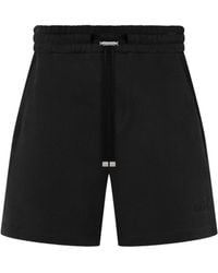 Amiri - Logo Embroidered Shorts - Lyst