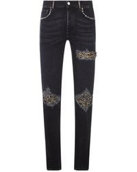 Amiri - Studded Distressed Jeans - Lyst
