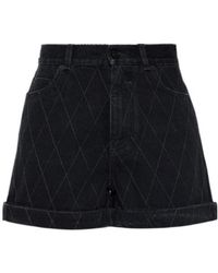 Balmain - Diamond-Quilted Turn-Up Shorts - Lyst