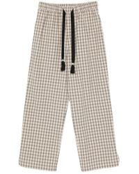 Nanushka - Check-Pattern Tassel-Detail Trousers - Lyst