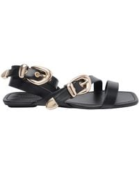 Stuart Weitzman - Buckle Flat Sandals - Lyst