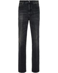 Ferragamo - Ferragamo Logo Patch Stonewashed Denim Jeans - Lyst