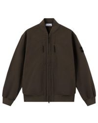 Stone Island - Logo Patch High Neck Jacket - Lyst