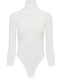 Alaïa - Long-Sleeved Jumpsuit - Lyst