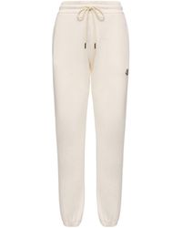 Moncler - Logo Cotton Blend Fleece Sweatpants - Lyst