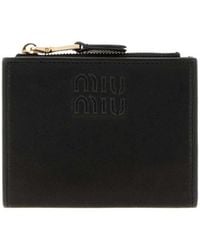 Miu Miu - Logo-Embossed Zip-Fastening Wallet - Lyst