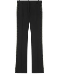 Versace - Stud-Embellished Creased Trousers - Lyst