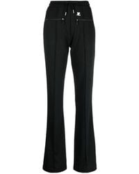 Courreges - Courrèges Drawstring Pleated Bootcut Pants - Lyst