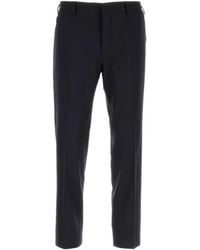Prada - Triangle-Logo Trousers - Lyst