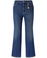 Stella McCartney - Mid-Rise Flared Jeans - Lyst