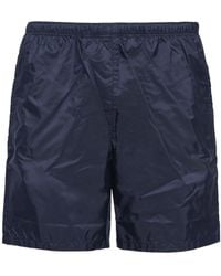 Prada - Triangle Logo Plaque Elastic Swim Shorts - Lyst