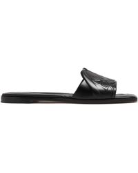 McQueen - The Seal Embossed Slip-On Slides - Lyst