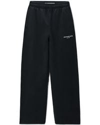 Alexander Wang - Logo-Print Mid-Rise Oversized Sweatpants - Lyst