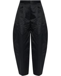 Alaïa - Alaïa Pleated Rounded-Leg Pants - Lyst