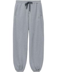 McQueen - Skull Embroidered Tapered Sweatpants - Lyst