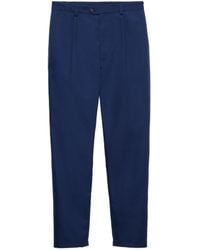 Prada - Pleated Poplin Trousers - Lyst