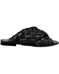 Bottega Veneta - Sleek Flat Mules - Lyst