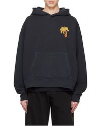 パーカー・フーディ Palm Angels Burning Monogram Print Sweatshirt Palm Angels Burning monogram-print Sweatshirt | Black | FARFETCH