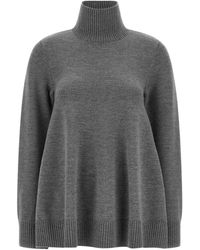 TOTEME - Roll-Neck Flared Sweater - Lyst