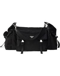 Prada - Explore Re-Nylon And Leather Duffel Bag - Lyst