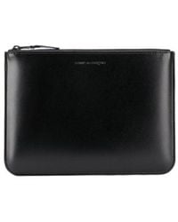 Comme des Garçons - Comme Des Garçons Wallet Logo Embossed Zipped Wallet - Lyst