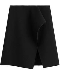TOTEME - Totême Slit Scuba Skirt - Lyst