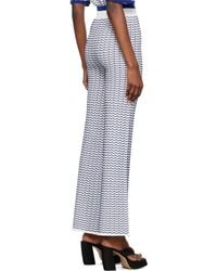 REMAIN Birger - Striped Flared Casual Pants - Lyst