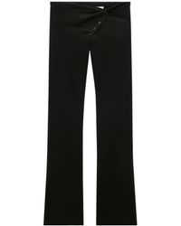 Courreges - Twist-Front Bootcut Wool Trousers - Lyst