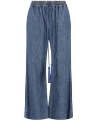 Valentino - Logo Plaque Wide Leg Jeans - Lyst