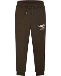 BOSS - Solid Color Casual Pants - Lyst