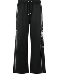 Amiri - Lasso Embroidered Track Pants - Lyst