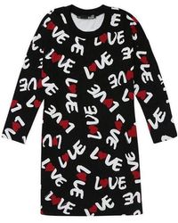 Moschino - Long-Sleeved Slogan Short Dress - Lyst