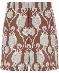 Valentino - Floral Patterned Logo Printed Shorts - Lyst