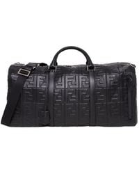Fendi - Logo-Embossed Holdall Bag - Lyst