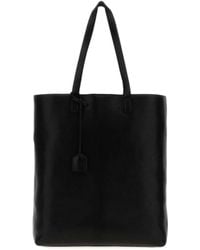 Saint Laurent - Logo Debossed Top Handle Bag - Lyst