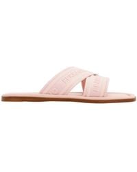 Ferragamo - Ferragamo Logo Embossed Slip-On Sandals - Lyst