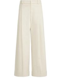 Brunello Cucinelli - Stretch Dyed Denim Pleated A-Line Trousers With Monili - Lyst