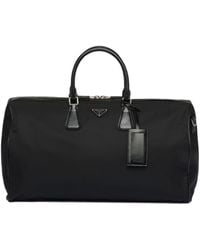 Prada - Re-Nylon And Brushed Leather Duffel Bag - Lyst
