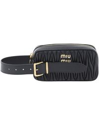 Miu Miu - Matelassé Logo Zip Clutch Bag - Lyst