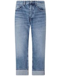 ICON DENIM - Monogram-Pattern Turn-Up Jeans - Lyst