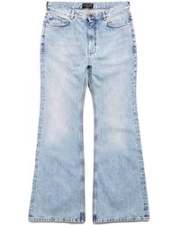 Balenciaga - Distressed Low-Waisted Flared Jeans - Lyst