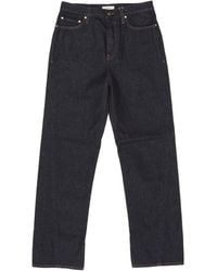 TOTEME - Totême Twisted-Seam Logo Patch Jeans - Lyst