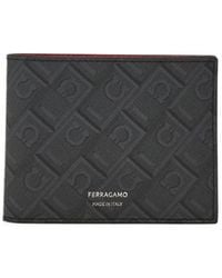 Ferragamo - Ferragamo Monogram Printed Bi-Fold Wallet - Lyst