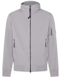 C.P. Company - Logo Plaque Hooded Jacket - Lyst