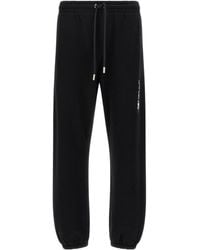 Off-White c/o Virgil Abloh - Ink Arrow Cuffed Joggers - Lyst